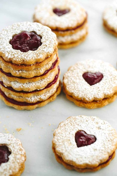 Cranberry Linzer Cookies Recipe - Jessica Gavin Cranberry Orange Jam, Linzer Cookies Recipe, Cranberry Orange Cookies, Orange Jam, Cranberry Jam, Christmas Cookie Box, Orange Cookies, Cookie Sandwiches, Linzer Cookies