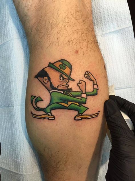 Notre Dame Tattoo Notre Dame Tattoos, Notre Dame Tattoo, Gamble Tattoo, Smart Tattoo, Leprechaun Tattoos, Mens Full Sleeve Tattoo, Motivation Tattoo, Claddagh Tattoo, Fighter Tattoos