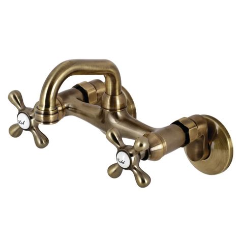 Kingston Brass KS212AB Kingston 1.8 GPM Wall | Build.com Wyoming Cabin, Wall Mounted Kitchen Faucet, Antique Brass Faucet, Kitchen Arrangement, Wall Mounted Bar, Blue Farmhouse, Speakeasy Bar, Bar Setup, Bar Faucet