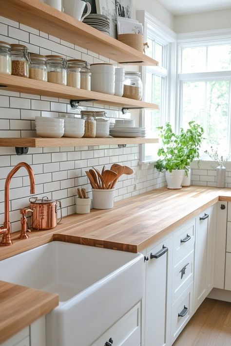 Match the perfect kitchen splashback with a butcher block countertop using these design tips and ideas. Butcher Block With White Backsplash, Kitchen Butcherblock Countertops, Kitchen Backsplash With Butcher Block Countertops, Kitchen Sink Butcher Block Counter, Kitchen Backsplash With White Cabinets And Butcher Block Counters, Kitchen Inspo Butcher Block, Butcher Block Countertops With White Cabinets, Butcher Block Countertop Kitchen, Live Edge Kitchen Countertops