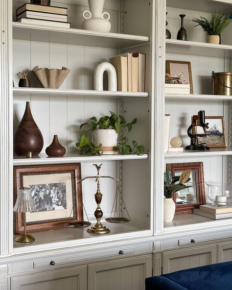 I have been on the hunt for a vintage scale- I am a Libra after all. Well, when I spotted this beauty at one of @ladygonerogue sale, I knew I found the one (she has the most amazing vintage and antique finds!). Now I need help finding a home for this! The foyer console table or the living room bookshelf? Let me know what you think! I’m tempted to put the scale in the Round Room, but feel that will be too tempting for my tiny humans! #fridaysareforphotos #collectedhome #vintage Styled Shelf Living Room, Earthy Bookshelf Decor, Antique Bookshelf Decor, Shelf Decor Living Room Vintage, Large Bookshelf Decor, Vintage Bookshelf Decor, Vintage Bookshelf Styling, What To Put On Shelves, Living Room Built Ins Decor