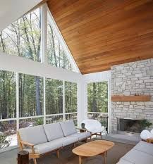 Triangle Windows | Pella Fireplace Sunroom, Rustic Sunroom, Architecture Residence, Triangle Window, Mid Century Modern Farmhouse, Sunroom Addition, Modern Exterior House, Sunroom Designs, Open Floor Plans