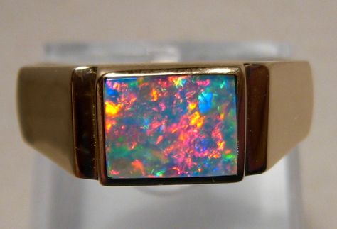 A quality opal ring for men with a rectangle red and blue opal in 14k yellow gold. Inquire to buy in any ring size or gold color. Engagement Ring Men Gold, Male Engagement Ring Men, Opal Ring Men, Opal Ring For Men, Ring Men Gold, Male Engagement Ring, Engagement Ring Men, Mens Jewelry Pendants, Patio Privacy Screen