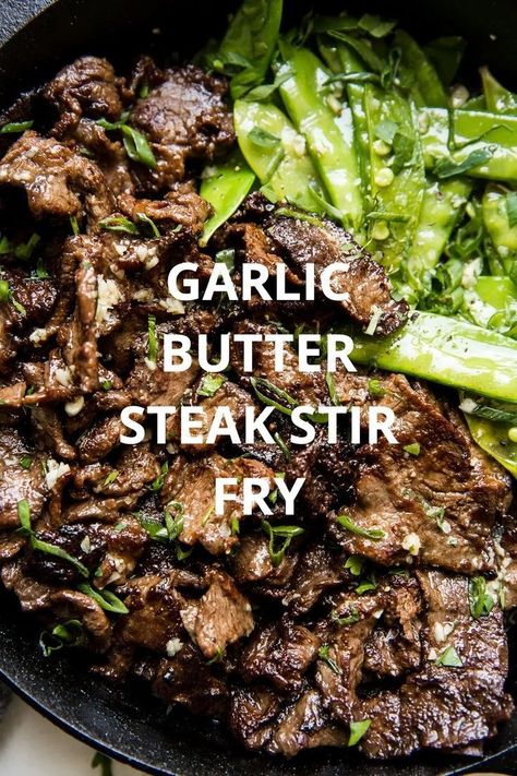 This steak stir-fry with a savory garlic-and-butter sauce feels indulgent, and is so easy to make. Served on its own or with rice, it’s the perfect quick weeknight dinner. #food #worksheets #kids Stir Fry With Snow Peas, Steak Stirfry Recipes, Stir Fry Meat, Strip Steak Recipe, Fried Steak Recipes, Steak Stir Fry, Steak And Rice, Easy Stir Fry Recipes, Beef Stir Fry Recipes