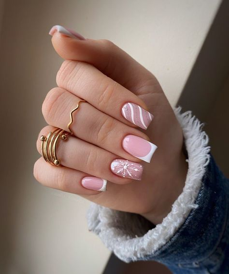 Step into the holiday season with these adorable pink snowflake nails. With a soft, pastel palette and delicate snowflake patterns, this design offers a sweet and playful look, ideal for adding a touch of winter wonder to your nails during the festive season. Pink Snowflake Nails, Designs On Natural Nails, Edgy Nail Art, Christmas Nails Ideas, Pink Snowflake, Christmas Nail Ideas, Snowflake Patterns, Square Nail, Cute Simple Nails