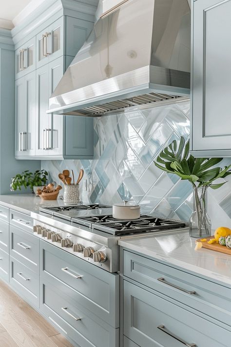 beach kitchen with glass backsplash Coastal Kitchen Grey Cabinets, Coastal Home Kitchen Ideas, Beachy Backsplash Kitchen, Beach Backsplash Kitchen, Blue Glass Backsplash Kitchen, Beach Houses Interiors, Florida Kitchen Remodel, Beachy Backsplash, Coastal Backsplash