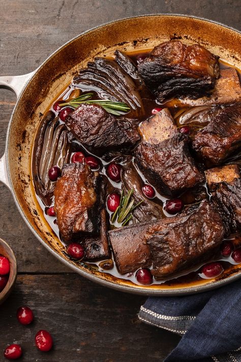 The ultimate comfort food, Balsamic Rosemary Braised Short Ribs with Cranberries become meltingly tender when braised for hours in a bath of red wine and balsamic vinegar. They would make the perfect meal for a cozy, Sunday supper, especially when served with buttery mashed potatoes to soak up every bit of the sauce. Cast Iron Braiser, Buttery Mashed Potatoes, Culinary Techniques, Braised Short Ribs, Frozen Cranberries, Braised Beef, Beef Short Ribs, Enameled Cast Iron, Ultimate Comfort Food