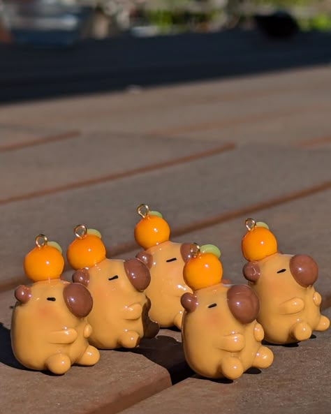 Some capybara photoshoot shots #capybara #claycapybara #clay #polymerclay #claycharms Air Dry Clay Capybara, Capybara Polymer Clay, Polymer Clay Capybara, Cute Polymer Clay Figures, Capybara Clay Art, Beginner Clay Ideas, Clay Inspo Ideas, Capybara Ceramic, Model Clay Ideas