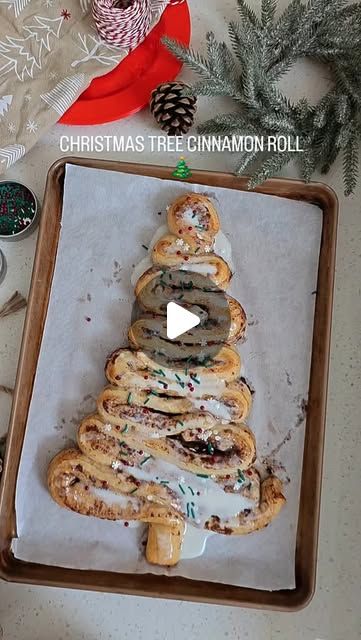 Tabitha Blue | Mom + Travel + DIY Home Creator on Instagram: "Christmas morning magic made easy! 🎄Made the cutest Christmas tree cinnamon roll, and it was SO easy thanks to a pre-made cinnamon roll pack. Festive, fun, and zero stress—just the way I like it! Who else is adding this to their holiday must-make list?" Canned Cinnamon Roll Christmas Trees, Christmas Tree Cinammon Roll, Cinnamon Roll Christmas Tree Pillsbury, Christmas Tree Shaped Cinnamon Rolls, Cinnamon Bun Christmas Tree, Cinnamon Rolls Tree, Cinnamon Roll Tree Breakfast, Tree Cinnamon Rolls, Cinnamon Roll Christmas Tree Breakfast