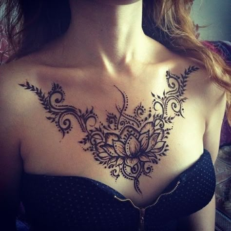 black-top-zipper-blonde-hair-small-chest-tattoos-lotus-flower-dots-fern Body Henna, Lower Belly Tattoos, Lotusblume Tattoo, Henna Hand Designs, Small Chest Tattoos, Belly Tattoos, Henna Inspiration, Tattoo Chest, Henna Body Art