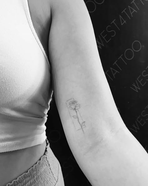 Single needle rose tattoo on the left inner arm. Tattoo Inside Arm Above Elbow, Lower Elbow Tattoo Women, Inner Arm Small Tattoos For Women, Dainty Inner Arm Tattoo, Inside Of Upper Arm Tattoo Women, Small Tattoos On Arms For Women, Rose Inner Bicep Tattoo, Rose Tattoo Inside Arm, Rose Tattoo Inner Bicep