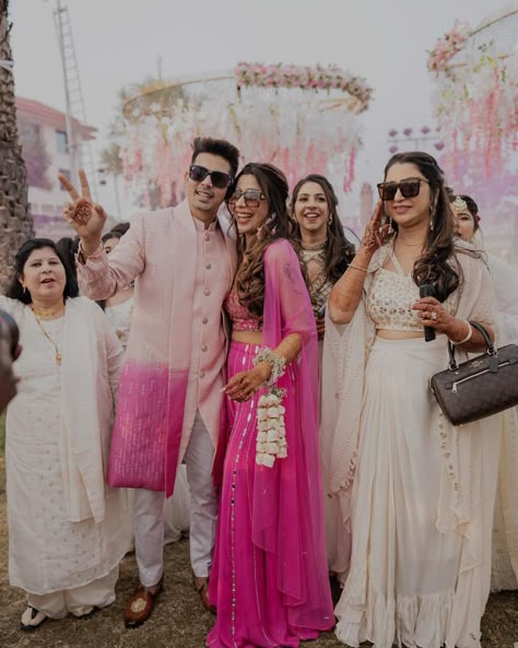 Bride And Groom Indian Wedding Outfit Pink, Family Haldi Outfits, Pink Haldi Outfits For Bridesmaid, Wedding Outfit For Bride And Groom, Haldi Bride And Groom Outfit, Pink Matching Couple Outfits, Haldi Dress For Bride And Groom, Bride And Groom Indian Wedding Outfit Matching, Haldi Family Outfits