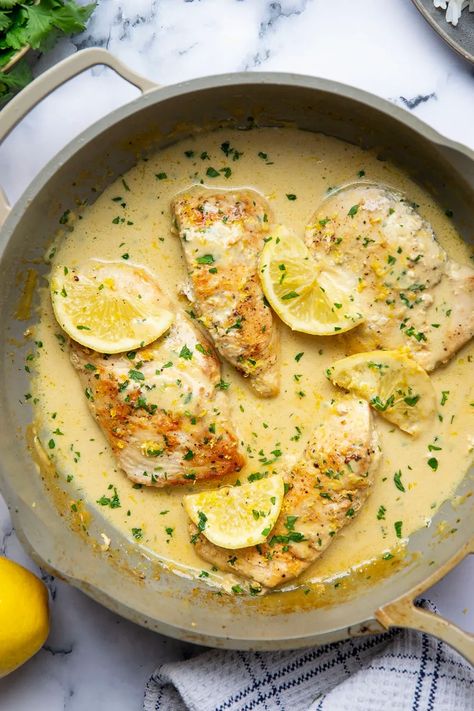 This lemon Dijon chicken features juicy seared chicken breasts simmered in a fresh lemon Dijon mustard cream sauce. Amazing over a bowl of rice or pasta! Creamy Dijon Chicken Casserole, Paleo Mustard Chicken, Chicken Thigh Dijon Mustard, Greek Yogurt Dijon Mustard Chicken, Rosemary Dijon Chicken, Chicken With Lemon Cream Sauce, Lemon Dijon Chicken, Lemon Sauce For Chicken, Dijon Mustard Chicken