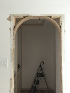 Diy Arched Closet, Black Archway Interior, Create An Archway Entrance, How To Make A Doorway Arch, How To Make Arch Doorway, Curved Doorway Ideas, Removing Arched Doorway, Brick Around Doorway, Arc Opening Wall