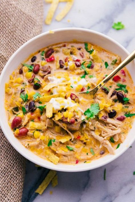 10 Yummy Soups For Fall Everyone Will Love - Society19 Tortilla Soup Crock Pot, Crock Pot Chicken Tortilla Soup, Soup Tortilla, Slow Cooker Tortilla Soup, Tortilla Chicken, Healthy Chicken Tortilla Soup, Soup Crock Pot, Fajita Soup, Chicken Tortilla Soup Crock Pot