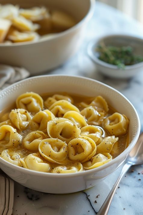 This revamped version of the classic Tortellini in Brodo takes a delightful twist, adhering to both the Silver Fork Gluten-Free ethos and the Whole Health Flexi-Plan diet. By utilizing a hearty and nutritious bone broth and a gluten-free pasta, we've created a sumptuous dish that doesn't just satisfy your Italian cuisine cravings but does so in a health-conscious manner. Perfect for those seeking to enjoy traditional flavors without gluten. Pasta Broth Soup, Bone Broth Pasta, Gluten Free Tortellini, Gluten Free Pasta Dough, Gluten Free Soup Recipes Glutenfree, Tortellini In Brodo, Healthy Family Recipes, Unprocessed Food, Star Food