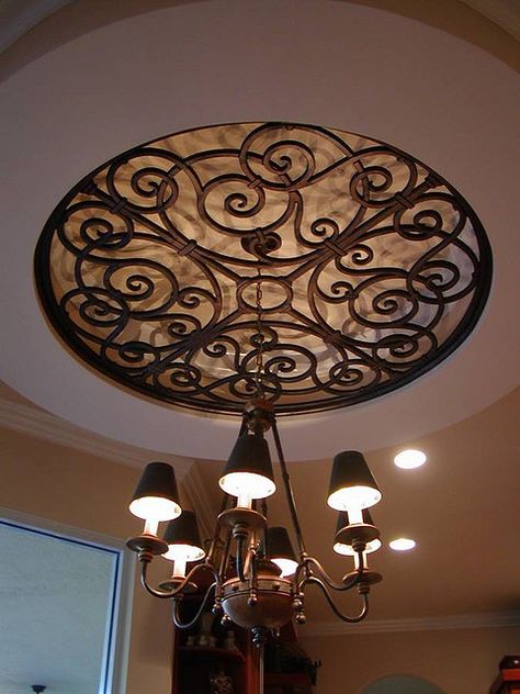 Faux Wrought Iron Ceiling Medallion Over Chandelier. love it but I would make the chandelier as fine as the iron ceiling. Faux Wrought Iron, Faux Iron, Iron Ceiling, Wrought Iron Decor, Tuscan Design, Tuscan House, Tuscan Decorating, Ceiling Medallion, Tuscan Style