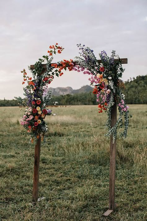 Fall Boho Wedding Flowers Arch, Wooden Flower Wedding Arch, Archway Floral Arrangement, Arbour Flowers Floral Arrangements, Wedding Ceremony Archway, Wedding Arch With Wildflowers, Wedding Arch Flowers Wildflowers, Floral Arrangements Backdrop, Whimsical Wedding Altar