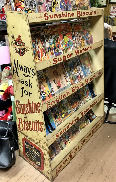 A wonderful metal grocery shelf for “Sunshine Biscuits” products. Covered in fantastic lettering! Probably from the 1940’s. Currently being used as a comic book stand in a thrift shop. Zine Storage, Be Our Guest Bedroom, 80’s Room, Game Room Layout, Sunshine Biscuits, Dream Comic, Fallout Theme, Geek Aesthetic, Comic Storage