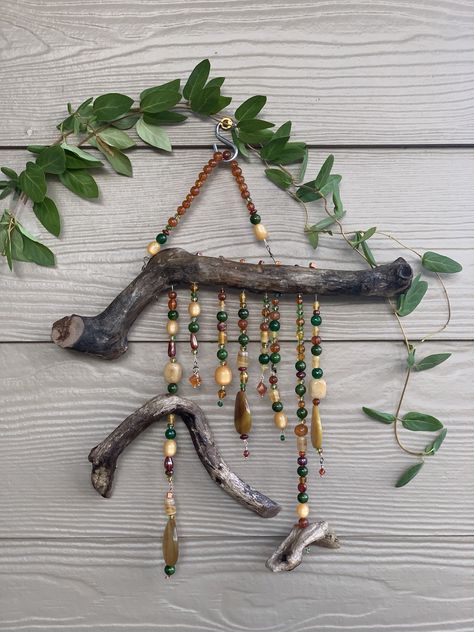 Stick With Beads Hanging, Driftwood Suncatchers, Driftwood Suncatcher, Driftwood With Crystals, Driftwood Crystal Suncatcher, Driftwood Crystal Wall Hangings, Driftwood And Beads Sun Catcher, Hanging Plants Diy, Glass Bead Crafts