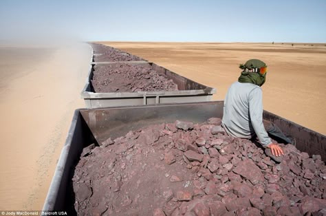 MacDonald said: 'Train hopping thorough the Sahara on one of the world's longest trains. T... Urbex Aesthetic, Train Surfing, Train Hopping, Desert Culture, Camera Tips And Tricks, Train Movie, Surf Wave, Desert Sahara, Railroad Crossing