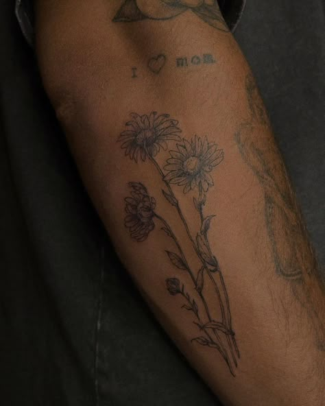 Misha's daisies 🤍 #indovtattoo | Instagram Make Arm Tattoos, Bundle Of Sunflowers Tattoo, X Inspired Tattoos, Men’s Daisy Tattoo, Masculine Daisy Tattoo, Guy Flower Tattoo, Words On Collar Bone Tattoo, Masculine Patchwork Tattoo, Small Manly Tattoos