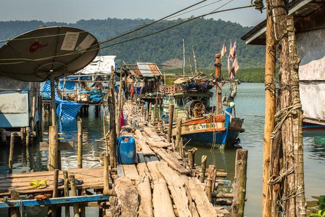 Huts and Fishing Boat at the Pier in at Fisherman Village Editorial Stock Image - Image of destinations, poor: 66307124 Akira City, Medieval Fishing Village, Pirate Village, Swamp Aesthetic, Reference Background, Tatsuyuki Tanaka, Fisherman Village, Village Photo, Whale Tale