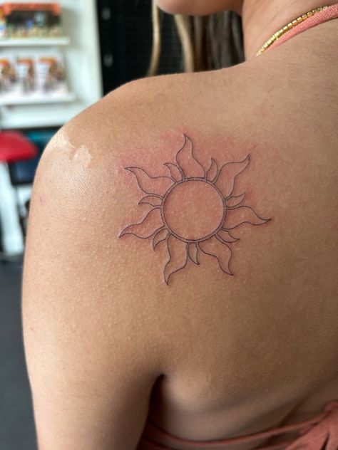 Sun In Rapunzel, Rapenzul Tattoo, Rapunzels Flower Tattoo, Repunzal Tattoo Ideas, Yellow Word Tattoo, Tangled Tiny Tattoo, Rapunzel Tangled Tattoo, Rapunzel Aesthetic Tattoo, Tangled Movie Tattoos