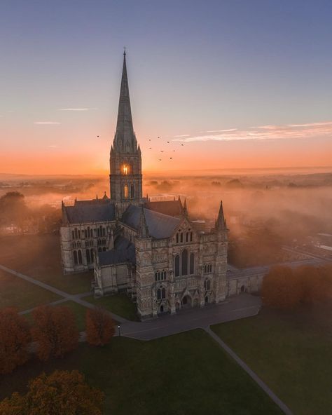 Salisbury Cathedral is looking terror-ifically beautiful here 👻. Did you know the first cathedral was completed at Old Sarum in 1092?… Places To Visit In England, Salisbury Cathedral, Concrete Buildings, Church Pictures, Gothic Cathedrals, Skyscraper Architecture, Cathedral City, People Walking, Old Churches