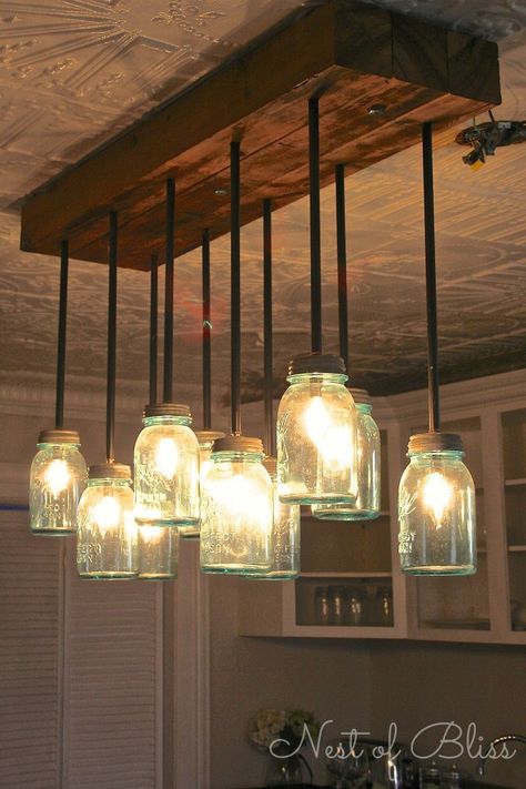 DIY manson jar chandelier wedding decor ideas ขวดโหล Mason Jar, Jar Chandelier, Mason Jar Chandelier, Rustic Industrial Decor, Diy Mason Jar, Versace Home, Mason Jar Lighting, Deco Luminaire, Rustic Lighting