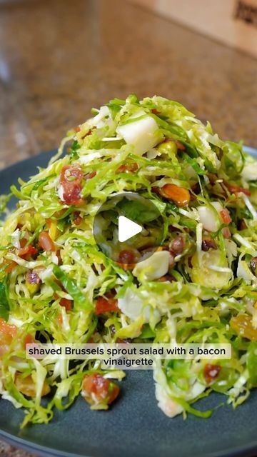 Kelly Scott on Instagram: "How to make a warm Brussels sprout salad with bacon vinaigrette 🥓 ⬇️

Follow @kellyscleankitchen for more recipes!

Comment “RECIPE” to get this straight to your DMs or see the below recipe!

When it comes to salads I don’t mess around! I am a huge salad lover, but only if it is hearty, packed with varying flavors, and tons of great textures. This warm brussels sprout salad with bacon vinaigrette ticks all of those boxes. If you are a fan of brussels and bacon, you are going to be obsessed with this salad!

Recipe ⬇️

Ingredients:
* 
* 1/2 lb bacon, thinly sliced
* Vinaigrette:
 * Fat from cooking the bacon
 * 1 shallot, minced
 * 3-5 garlic cloves, minced
 * 1 tbsp maple syrup
 * 1 tbsp dijon mustard
 * 1/2 lemon, juiced
 * salt and pepper
* 20 oz brussels spro Warm Bacon Vinaigrette, Brussel Sprout Slaw, Bacon Vinaigrette, Brussel Sprout Salad Recipes, Brussels Sprout Salad, Sprout Salad, Vinaigrette Salad, Sprouts Salad, Brussels Sprout