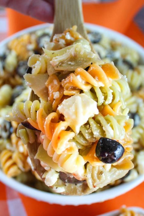 Chicken Salad Chick Pasta Salad is an easy-to-make, potluck-perfect pasta salad! Tri-color rotini pasta tossed with Italian dressing, feta & parmesan cheese, black olives & artichoke hearts. Color Pasta Salad, Turkey Muffins, Chicken Salad Chick Recipe, Tri Color Pasta Salad, Artichoke Pasta Salad, Homemade Chicken Salad, Crockpot Meal Prep, Chicken Salad Chick, Lasagna Chicken