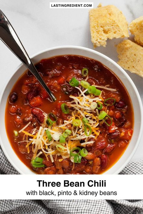 With black beans, pinto beans and kidney beans, this easy three bean chili is seasoned with a mix of dried spices, minced jalapenos and garlic. It’s a great make-ahead recipe for lunch or dinner. You can also make this easy vegetarian chili for game day. Four Bean Chili, Bean Chili Recipe Vegetarian, Taco Chilli, Chili Recipe With Corn, Healing Soups, Easy Vegetarian Chili, Three Bean Chili Recipe, Pinto Bean Chili, Easy Vegetarian Chili Recipe