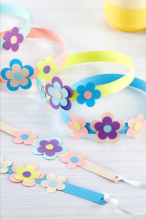 Blossom into crafting royalty this summer by creating this adorable paper flower crown. This is the perfect craft to try out with kids at home or in the classroom. To create it, gather up your supplies: your favorite colors of Astrodesigns Cardstock (We recommend the Astrodesigns Blooms & Blossoms Cardstock!), scissors, and glue. Start the crafting adventure by snagging Astrodesigns Blooms & Blossoms Cardstock at Amazon and downloading the free template at the link. *Difficulty: Easy* Kids Crown Craft, Mother S Day Crafts For Kids, Rose Crafts For Kids, Flower Crown For Kids, Crown Crafts For Kids, Paper Crowns For Kids, Flower Crown Craft, Mother's Day Crafts For Preschoolers, Paper Headband