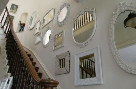 I really like this idea of new and old white mirrors together Decorating Stairway Walls, Stairway Walls, Stairway Wall, Picture Arrangements, Mirror Gallery, Mirror Gallery Wall, Traditional Staircase, Stair Wall, Family Photo Wall