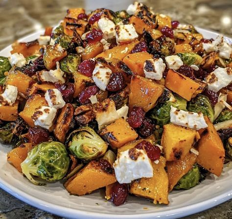 ￼ 🍂 Cranberry-Glazed Roasted Butternut Squash, Brussels Sprouts, and Sweet Potato Salad with Cranberries and Goat Cheese 🧀  This fall-inspired salad brings together roasted butternut squash, Brussels sprouts, and sweet potatoes, topped with tangy cranberry glaze, creamy goat cheese, and extra cranberries for a delicious balance of sweet and savory flavors.  Ingredients:  For the Roasted Vegetables: 1 small butternut squash, peeled and cubed 1 lb Brussels sprouts, trimmed and halved 2 medium sweet potatoes, peeled and cubed 3 tablespoons olive oil Salt and pepper, to taste 1 teaspoon dried thyme  For the Cranberry Glaze: 1/2 cup cranberry juice 1/4 cup dried cranberries 2 tablespoons honey or maple syrup 1 tablespoon balsamic vinegar  For the Finishing Touch: 4 oz goat cheese, crumbled 1/ Sprouting Sweet Potatoes, Salad With Cranberries, Sweet Potato Salad, Goat Cheese Recipes, Sprouts Salad, Diet Recipes Easy, Salad With Sweet Potato, Goat Cheese Salad, Roasted Butternut