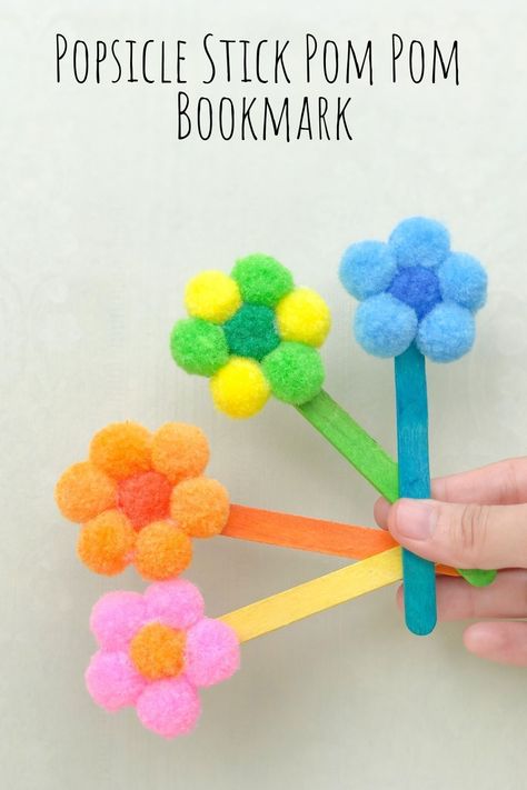 This easy popsicle stick pom pom bookmark is a great (and cheap!) way to give your kids a fun craft to make this summer! Abatelenguas Ideas, Pom Pom Bookmark, Babysitting Crafts, Popsicle Crafts, Summer Camp Crafts, Craft To Make, Camp Crafts, Toddler Arts And Crafts, Market Day