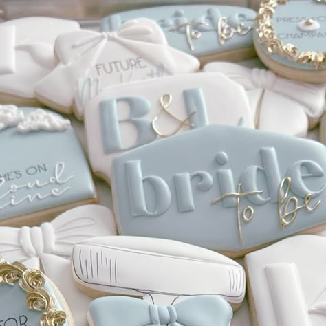 Leah Malvarose on Instagram: "When you get to make your own bridal shower cookies 😊☁️💍🖤 t-minus 61 days! • • • #decoratedcookies #customcookies #cookiesofinstagram #sugarsbyleah #bridalshowercookies #pressforchampagne #shesoncloudnine" Coastal Bridal Shower Favors, Something Blue Bridal Shower Cake, Something Blue Bridal Shower Cookies, Cloud Bridal Shower Theme, Blue Bridal Shower Cookies, Coastal Bridal Shower Ideas, Bridal Shower Cookies Ideas, Something Blue Bridal Shower Theme, Something Blue Bridal Shower Ideas