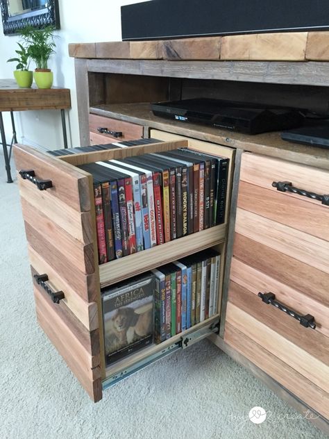 Not the console idea I have in mind, but these media storage drawers are pretty brilliant. Dvd Storage Ideas Diy, Dvd Storage Cabinet, Dvd Storage Ideas, Diy Dvd Storage, Reclaimed Wood Media Console, Diy Dvd, Tv Corner, Tv Stand With Drawers, Wood Media Console