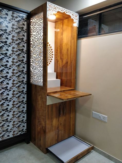 Mandir Storage Design, Compact Pooja Unit, Compact Mandir Designs, Tv Unit With Puja Unit, Mandir With Storage, Home Mandir Designs, Living Room Cabinet Ideas, Pooja Unit Designs, Puja Unit Design