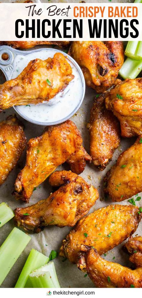 image: crispy baked chicken wings and celery sticks with ranch dressing in vintage measuring cup. Title text: The Best Crispy Baked Chicken Wings How To Make Wings Crispy In Oven, Healthy Baked Wings Oven, Baked Chicken Wings Oven Easy, Crispy Oven Baked Chicken Wings Corn Starch, Oven Fried Chicken Wings Baking Soda, Over Baked Chicken Wings, Baked Chicken Party Wings Recipes, Bone In Chicken Wings Oven Baked, Chicken Wings In Oven Recipes