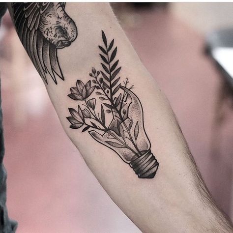 Plants in a lightbulb tattoo inked on the left forearm by Jonas Ribeiro Tattoos On Growth, Tattoos Of Growth, New Growth Tattoo, Tattoo Ideas About Growth, Tattoo Ideas For Growth, Growth Tatoos, Tattoos Growth, Tattoo About Growth, Tattoos That Mean Growth