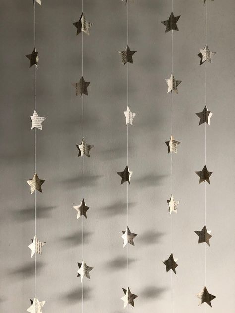 DIY Paper Stars Mobile: A Creative and Easy Craft Project Book Page Star Garland, Star Room Decor, Star Hanging Decorations, Paper Star Garland, Website Bio, Stars Decor, Winter Wedding Decor, Wall Decor Party, 3d Stars