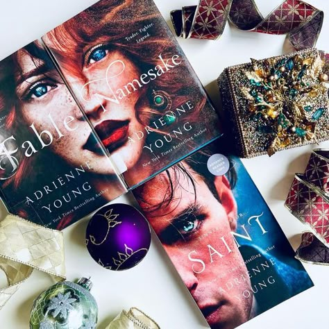 Kariné | Bookstagram on Instagram: "✨ Stunning Book Covers ✨ ❓Do you ever judge a book by its cover❓ I'm often guilty of that 😄 The Fable series by @adrienneyoungbooks in my opinion has one of the most recognizable and stunning book covers. Do you agree? 🤩 Today is also a #bookbirthday for Saint, a prequel to Fable and Namesake. Have you read this series? If so, what were your thoughts? #YAfantasy #fantasybooks #fantasyreads #maritimefantasy #swordandsorcery #fantasyaction #newrelease #boo Fable Aesthetic, Fable Fanart, Fable Namesake, Fable Book, Dream Bookshelves, Fable Books, Booktok Aesthetic, Digital Wedding Invitations Design, The Fable