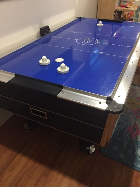 Air Hockey 7ft long air hockey game. Pucks are knocked back and forth to score a goal on a airy surface Movie Room Design, Basement Movie Room, Realistic Home, Hockey Table, Air Hockey Table, Bounce Houses, Recreation Room, Air Hockey, Hockey Game