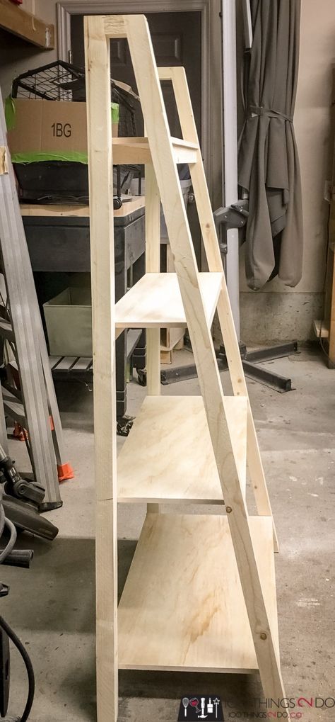 Freestanding, Angled Bookcase - free building plans! | 100 Things 2 Do Pallet Ladder Shelf Diy, Plant Shelf Freestanding, Build A Ladder Shelf, Build Ladder Shelf, Diy Wooden Ladder Shelf, Ladder Shelf Plans Diy, Angled Bookcase Diy, Diy Wood Ladder Shelf, Diy Shelf Ladder