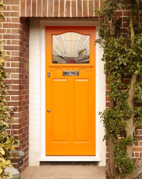 Art Deco Stained Glass Ideas and Inspiration | Hunker Art Deco Front Door, Orange Front Door, Bright Front Doors, Art Deco Doors, Orange Front Doors, Yellow Front Doors, Art Deco Stained Glass, Art Deco Door, Orange Door