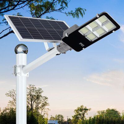 【SUPER BRIGHT & LONG WORKING】468 Super bright LEDs ,have the capability of producing over 300W light to supply lightening and security to your garage, pathway and more. solar street light built-in 36000mAH large capacity lithium battery, which will provide over 3 Night Lighting time after full charged. | Polar LED Solar Street Lights Outdoor, Dusk To Dawn Security Flood Light w/ Remote Control & Pole, Wireless, Waterproof, Perfect For Yard | Wayfair Led Parking Lot Lights, Parking Lot Lighting, Doors Makeover, Solar Flood Lights, Light Pole, Solar Street Light, Street Lights, Light Building, Flood Light