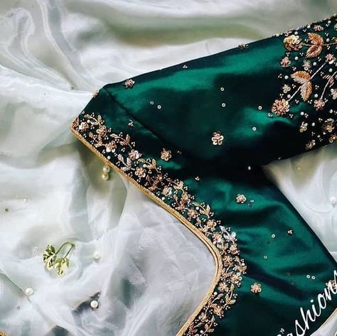 Dark green floral Work blouse Design Inspiration 💖 . Designer - @anu_designs_and_fashions . . . .… Bottle Green Bridal Blouse, Dark Green Bridal Blouse Design, Pink Green Blouse Designs, Maggam Work For Green Blouse, Dark Green Maggam Work Blouse Designs, Dark Green Aari Work Blouse Design, Dark Green Pattu Saree Wedding, Green Blouse Designs For Saree Silk, Silk Saree Blouse Work Designs