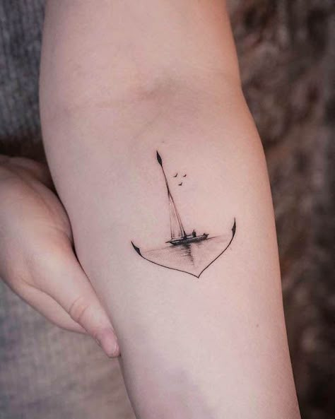 67 Meaningful Tattoos That You Won't Regret - Our Mindful Life Ocean Strength Tattoo, Nautical Hand Tattoos For Women, Sailing Tattoo Ideas, Tiny Ship Tattoo, Grow Through It Tattoo, Explore Tattoo Traveling, Never Mind Tattoo, Meaningfully Tattoos, Life Tattoos Meaningful